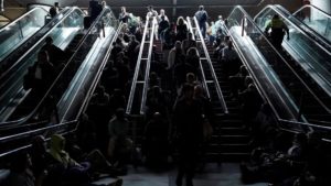 People wait on the stairs at Atocha train station in Madrid, during a massive power outage that left Spain and Portugal in the dark for hours. Ana Beltran/Reuters