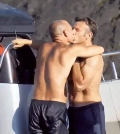 A fake image of French President Emmanuel Macron embracing a man; screenshot: Facebook